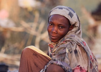 Najlaa Ahmed, a displaced Sudanese mother, looks on, following Rapid Support Forces (RSF) attacks on Zamzam displacement camp, as she shelters in the town of Tawila, North Darfur, Sudan April 16, 2025.