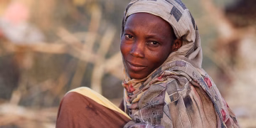 Najlaa Ahmed, a displaced Sudanese mother, looks on, following Rapid Support Forces (RSF) attacks on Zamzam displacement camp, as she shelters in the town of Tawila, North Darfur, Sudan April 16, 2025.