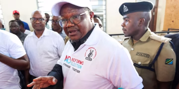 Tanzanian opposition leader and former presidential candidate of CHADEMA party Tundu Lissu is escorted as he walks at the Kisutu Resident Magistrate Court in Dar es Salaam, Tanzania April 10, 2025.