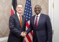 Kenyan and U.S. officials shake hands, symbolizing renewed trade cooperation under the AGOA extension.